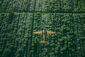 Crop Duster Spraying Crops in Field Royalty Free Stock Photo