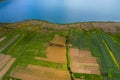 Crop fields in the Peruvian Andes Paca lake in Junin Royalty Free Stock Photo