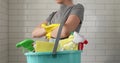Crop housewife prepared for total house cleaning