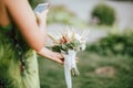 Crop photo of bridesmaid making picture of caught wedding bouquet, copy space