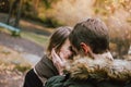 Crop photo of happy young couple in love friends dressed in casual style walking together on nature park forest in the Royalty Free Stock Photo