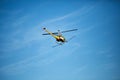 Crop sprayer duster helicopter, spraying mountains, fields and l