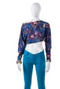 Crop top with turquoise pants.