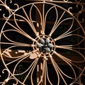 Crop view of architecture detail - antique wrought iron window