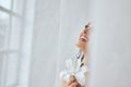 Portrait of girl posing with lily flower. Royalty Free Stock Photo