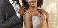 Cropped of african man giving woman beautiful golden chain Royalty Free Stock Photo