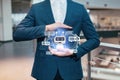 Cropped of businessman holding Chatbot virtual icon, collage