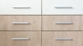 Cropped cabinet with six symmetric drawers