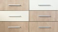 Cropped cabinet with six symmetric drawers