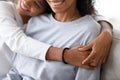Cropped image of african daughter embracing mother Royalty Free Stock Photo