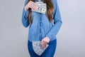 Cropped close-up photo portrait of confident concentrated she her lady covering closing places on body with pile stack of money