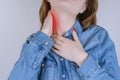 Cropped close up photo of sad unhappy upset lady suffering from pain in neck isolated on gray background copy-space