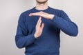 Cropped close up photo shot of satisfied angry ceo chief making giving time out signal to his trainees isolated grey background Royalty Free Stock Photo