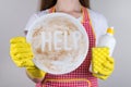 Cropped close up photo of unhappy asking to help her woman worker tired of piles stacks of dirty crockery utensils at home