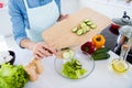 Cropped close-up view of her she nice girl housewife housemaid cooking lunch dinner dish snack chopping knife on wooden