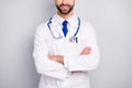 Cropped close-up view portrait of his he nice attractive qualified experienced skilled cheerful bearded guy medical