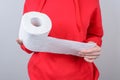 Cropped closeup photo picture of serious unhappy upset sad she people use take give white soft toilet paper in hand wear red