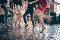 Cropped closeup photo of slim perfect legs girls guys meeting rejoicing dance floor x-mas party glitter flying wear