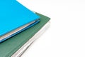 Cropped colorful folders with documents and bills on white table with copy space Royalty Free Stock Photo