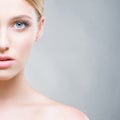 Cropped face of a beautiful woman with blue eyes. Skin care concept Royalty Free Stock Photo