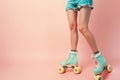 cropped female legs in rollerskates  on bright plain background in studio, female wearing roller blades on Royalty Free Stock Photo