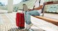 Cropped of freelancer working on laptop while waiting for train Royalty Free Stock Photo