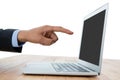 Cropped hand of businessman pointing on laptop