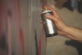 Cropped hand of man holding spray paint can Royalty Free Stock Photo