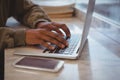 Cropped hands of businessman using laptop Royalty Free Stock Photo