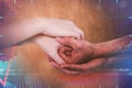 Composite image of cropped hands holding together Royalty Free Stock Photo