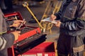 Aircraft mechanics staying in the aviation hangar