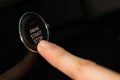 Cropped ifinger pressing car start button Royalty Free Stock Photo