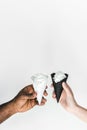 cropped image of african american boyfriend and girlfriend clinking with ice cream cones Royalty Free Stock Photo