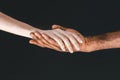 cropped image of african american boyfriend and girlfriend holding hands Royalty Free Stock Photo