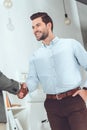 cropped image of african american and caucasian businessmen