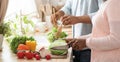 Cropped Image Of African American Couple Cooking Healthy Vegetarian Food In Kitchen Royalty Free Stock Photo