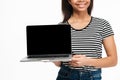 Cropped image of a african woman presenting blank screen laptop Royalty Free Stock Photo