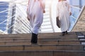 Cropped image of Arabic businessman going down and going up the Royalty Free Stock Photo