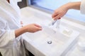 cropped image of boyfriend applying tooth paste on girlfriend