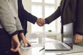Cropped image of business people greeting each other to confirm their partnership. Royalty Free Stock Photo