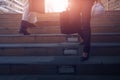 Cropped image of business person going down the stairs. Royalty Free Stock Photo