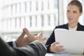 Cropped image of businessman in meeting with colleague at office cafe