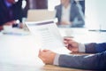 Cropped image of businesswoman reading report Royalty Free Stock Photo