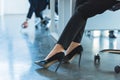 cropped image of businesswoman sitting on chair