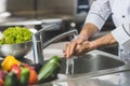 cropped image of chef washing hands Royalty Free Stock Photo