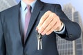 Cropped image of estate agent giving house keys Royalty Free Stock Photo