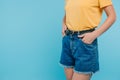 cropped image of girl standing with hands in pockets Royalty Free Stock Photo