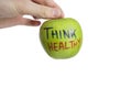 Cropped image of hand holding healthy granny smith apple over white background Royalty Free Stock Photo