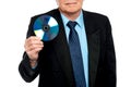 Cropped image of a male showing compact disk Royalty Free Stock Photo