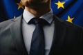 Cropped image of politics man in suit against European Union flag Royalty Free Stock Photo